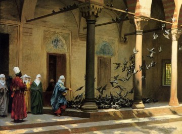 Mujeres del harén dando de comer a las palomas en un patio árabe Jean Leon Gerome Pinturas al óleo